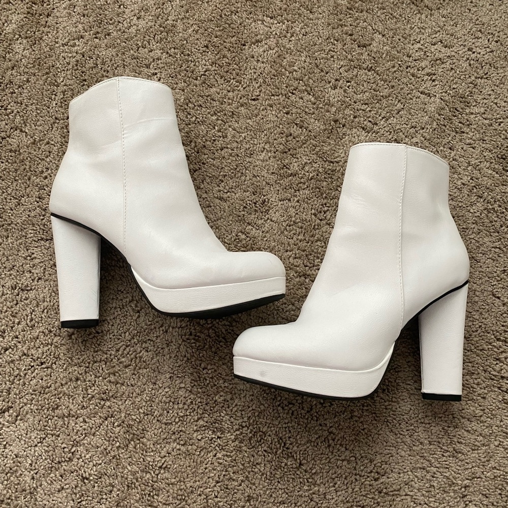 These three boutique white ankle boots